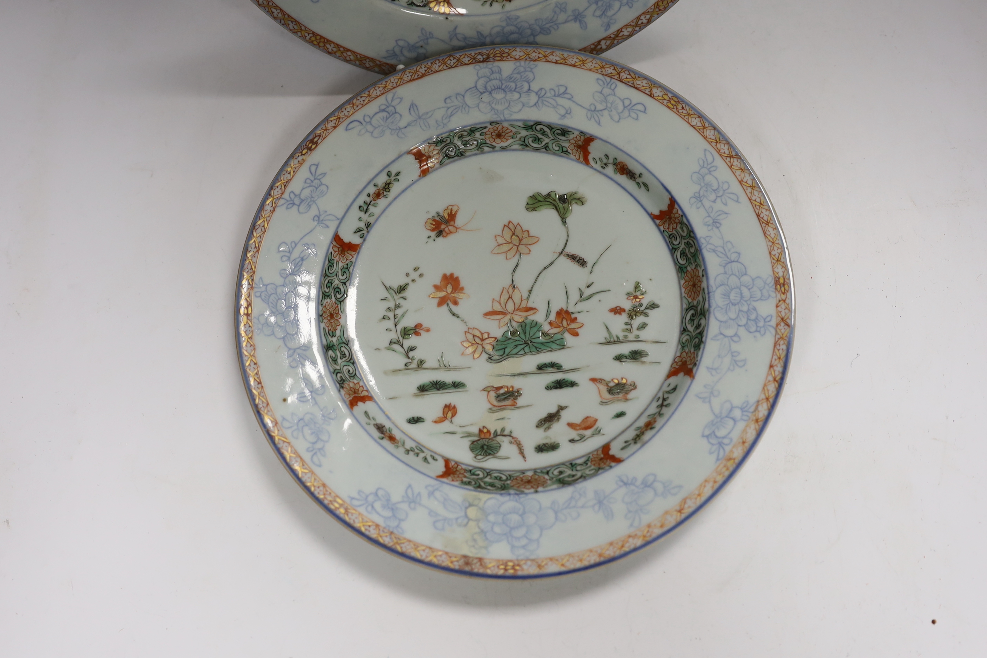 A pair of Chinese famille verte ‘lotus pond’ plates, Kangxi-Yongzheng period, 22.5cm